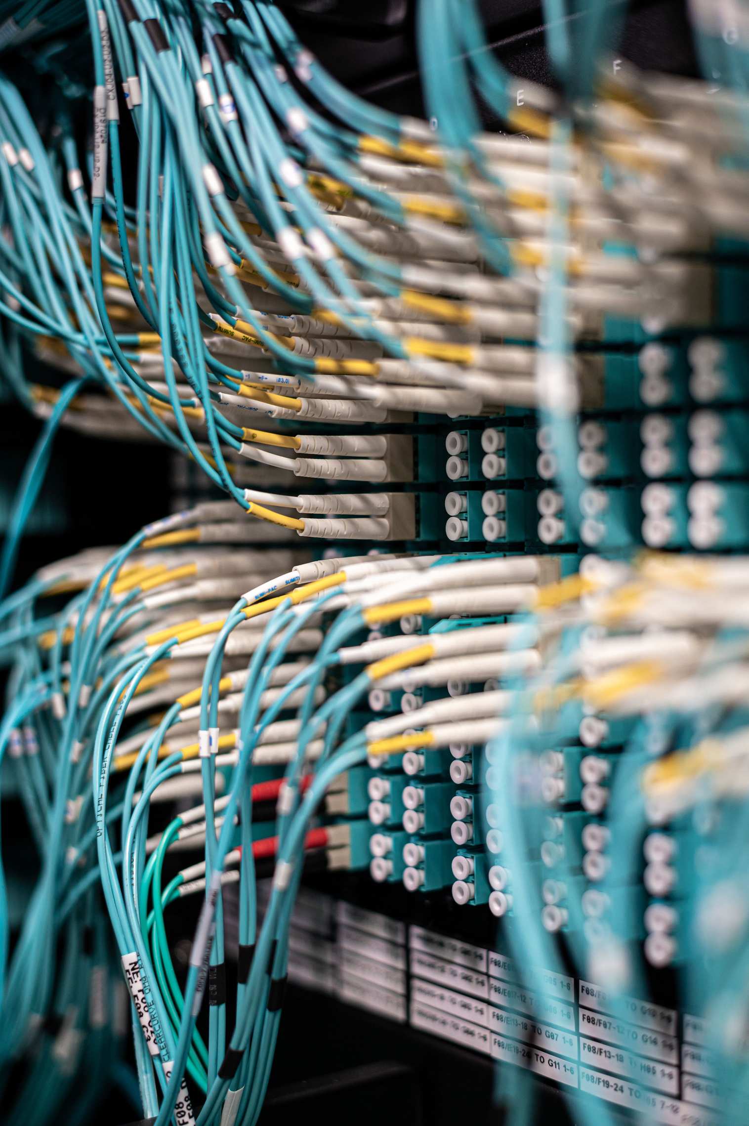 Network cables and server hardware in a rack with ethernet equipment
